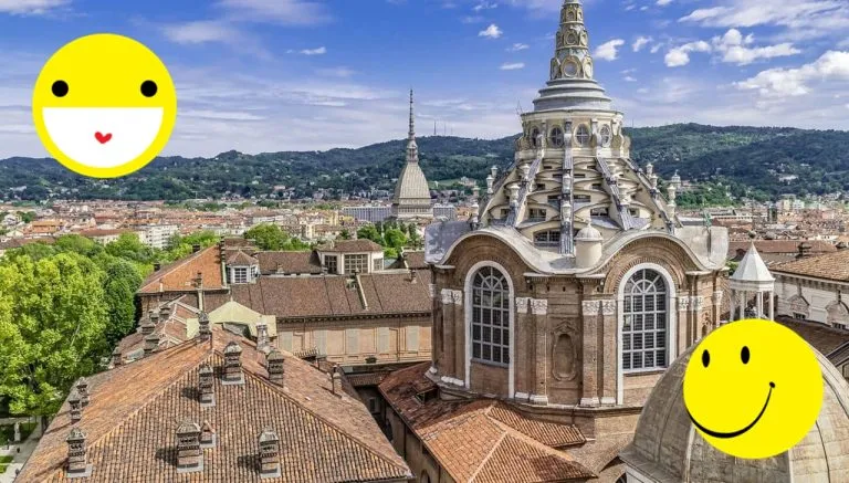 Panorama di Torino con simboli di felicità, a rappresentare la città tra le più felici del mondo nel 2025 secondo l’Happy City Index