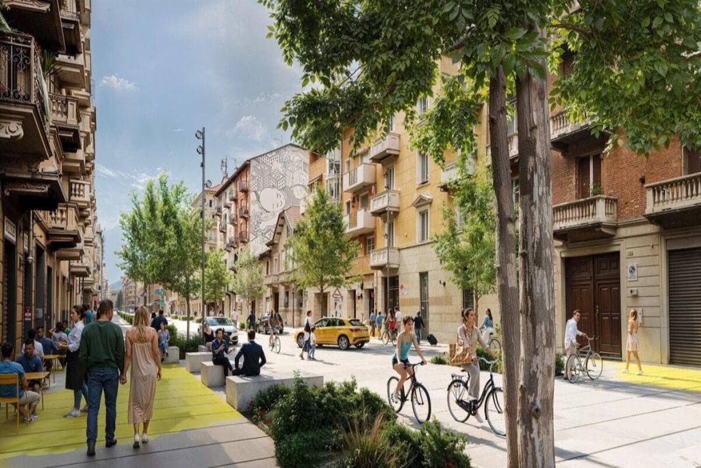 Visualizzazione realistica della futura corso Palermo riqualificata: ciclisti, pedoni, alberi e panchine lungo la nuova area urbana nel quartiere Barriera di Milano a Torino.